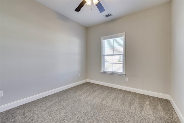 carpeted empty room with ceiling fan