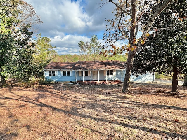 ranch-style house with a porch