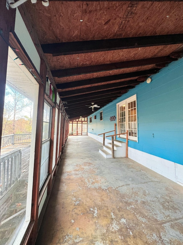 interior space featuring ceiling fan and covered porch