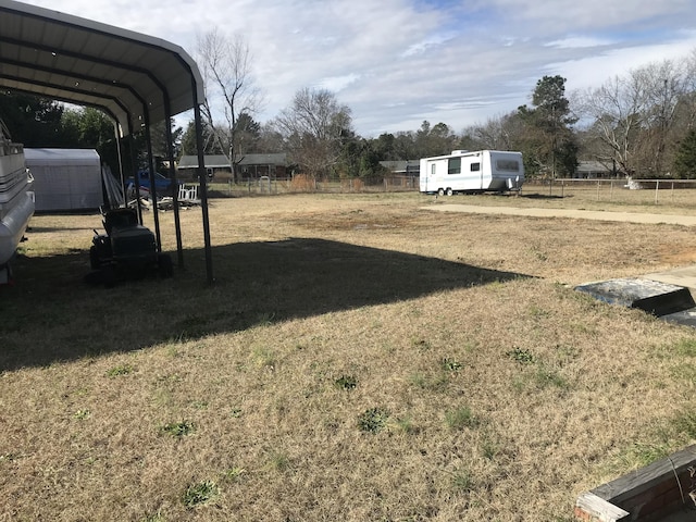 view of yard featuring a carport