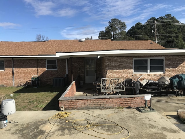 rear view of house with a patio