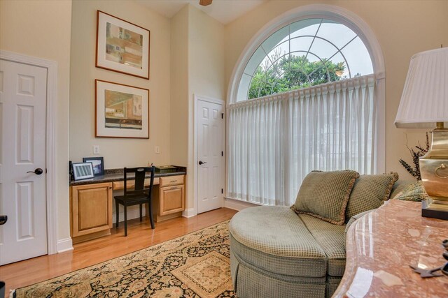 sitting room featuring light hardwood / wood-style flooring