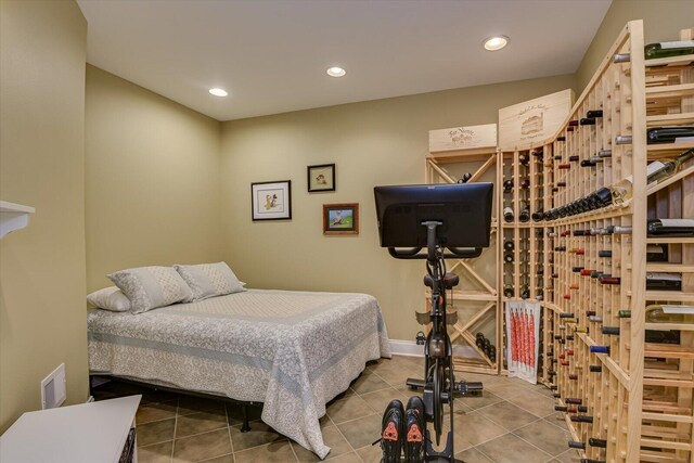 bedroom with tile patterned floors