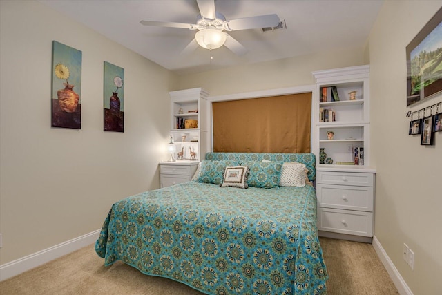 bedroom with light colored carpet and ceiling fan