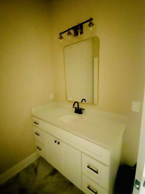 2016 Elite Ct, Hephzibah, GA 30815 - bathroom featuring vanity and baseboards
