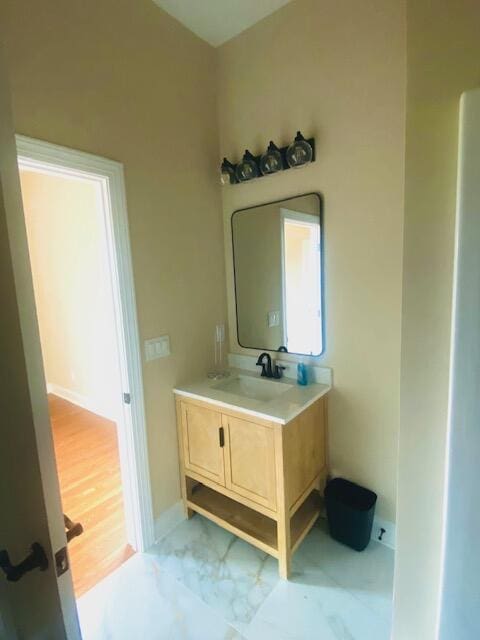 2016 Elite Ct, Hephzibah, GA 30815 - bathroom featuring vanity, marble finish flooring, and baseboards