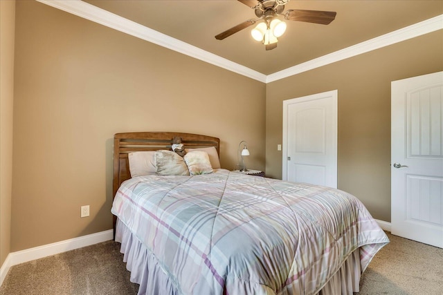 bedroom featuring ornamental molding, ceiling fan, and carpet