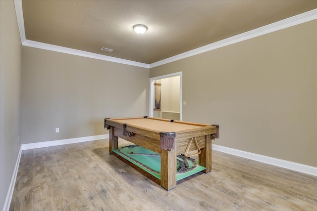 rec room with hardwood / wood-style flooring, pool table, and crown molding