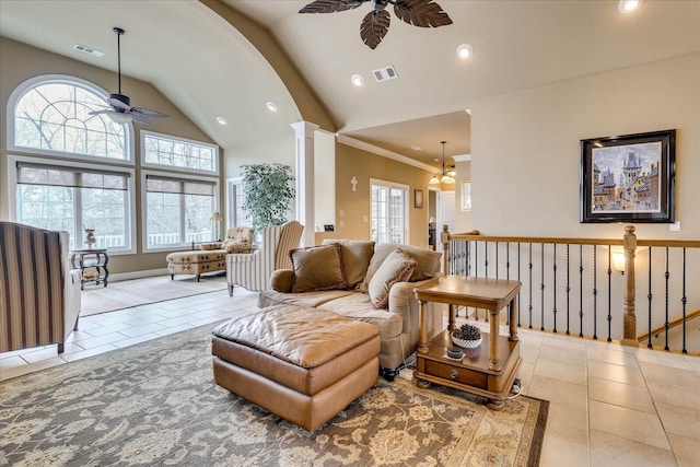 living room featuring crown molding, ceiling fan, tile patterned flooring, and ornate columns