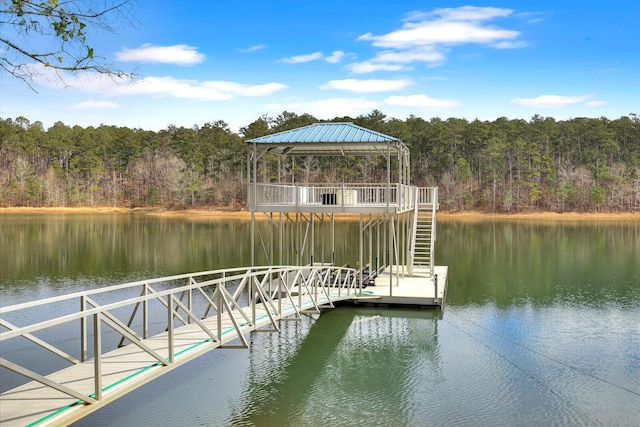 dock area with a gazebo and a water view