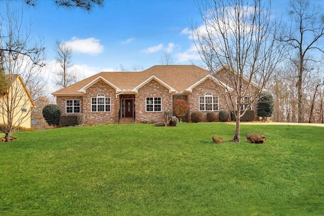 ranch-style house featuring a front lawn