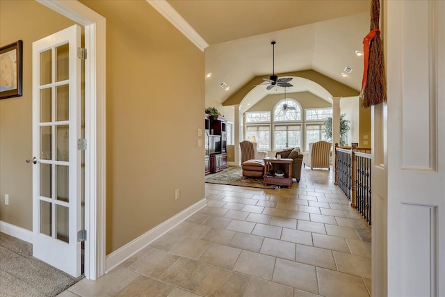 sitting room featuring vaulted ceiling, ceiling fan, light tile patterned flooring, and decorative columns