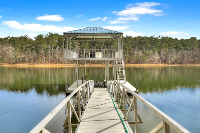 view of dock featuring a water view and a gazebo