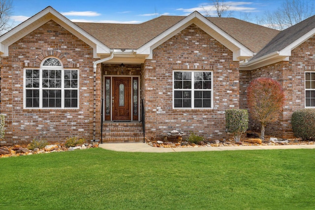 view of front of house with a front lawn