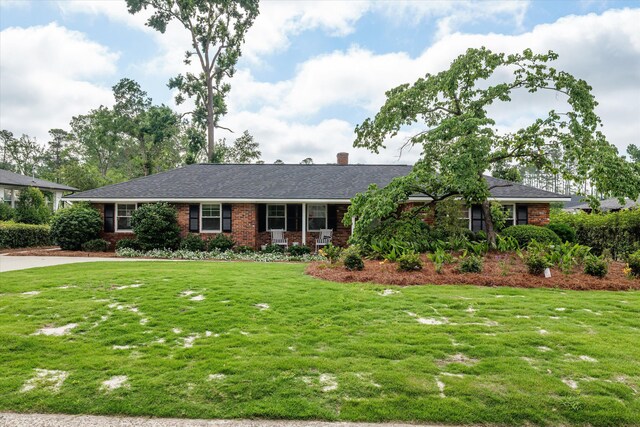 748 Mcclure Dr, Augusta, GA 30909 - single story home featuring brick siding, a front lawn, and a chimney