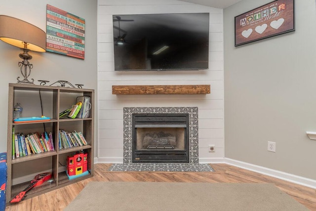 510 Sweet Meadow Dr, Grovetown, GA 30813 - detailed view of a ceiling fan, wood finished floors, baseboards, and a tiled fireplace