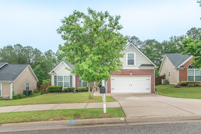 510 Sweet Meadow Dr, Grovetown, GA 30813 - view of front facade with brick siding, a garage, driveway, and central AC