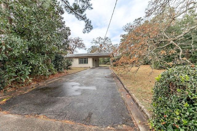 view of front of house with a carport