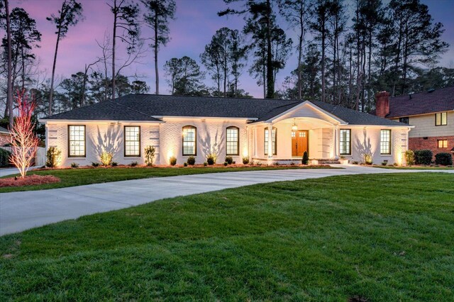 view of front of property featuring central air condition unit and covered porch