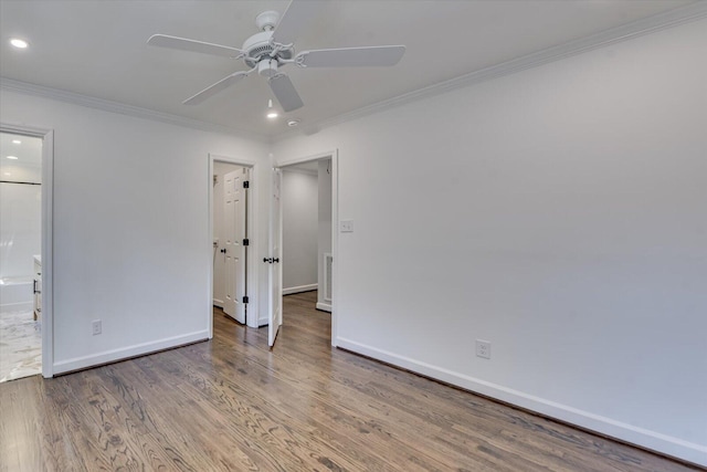 unfurnished bedroom featuring baseboards, ornamental molding, wood finished floors, and recessed lighting