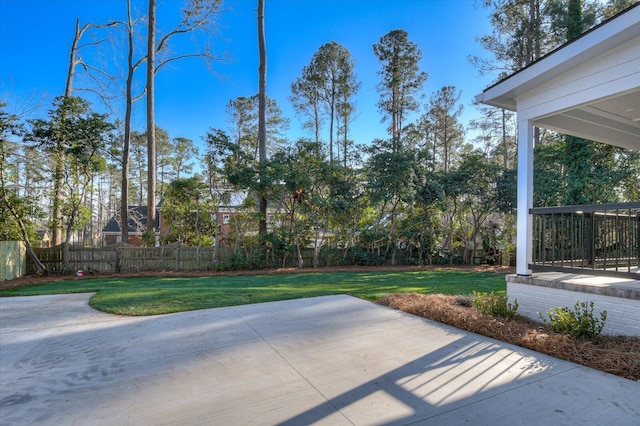 view of patio / terrace featuring fence