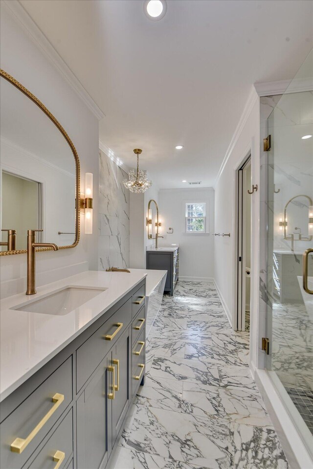 bathroom with marble finish floor, a marble finish shower, ornamental molding, and a sink