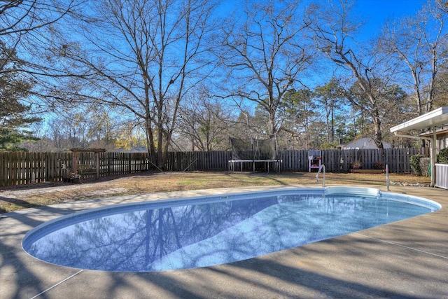 view of pool featuring a trampoline