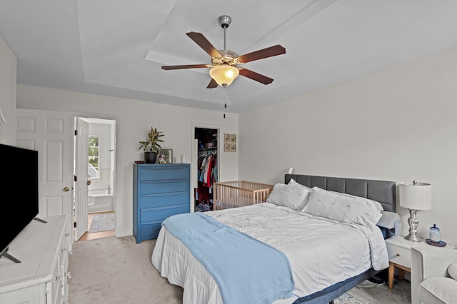 106 Moss Creek Dr, Martinez, GA 30907 - bedroom with light colored carpet, a walk in closet, a raised ceiling, a closet, and ensuite bathroom