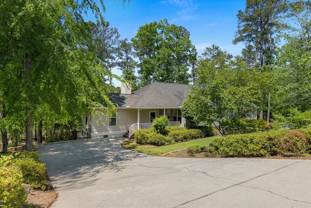 9 Caravel Cir, Mccormick, SC 29835 - view of front of home with covered porch, concrete driveway, and a chimney
