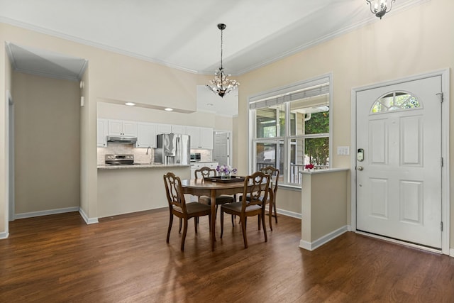 9 Caravel Cir, Mccormick, SC 29835 - dining area featuring a chandelier, crown molding, dark wood-style flooring, baseboards, and recessed lighting