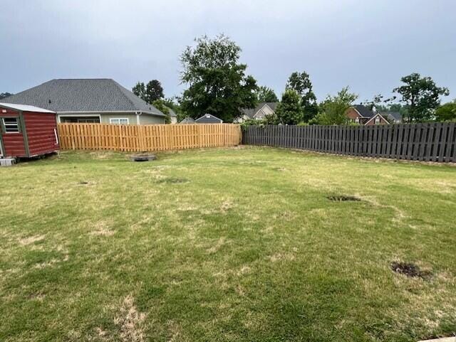 603 Yonto Dr, Grovetown, GA 30813 - view of yard with an outdoor structure and a storage unit
