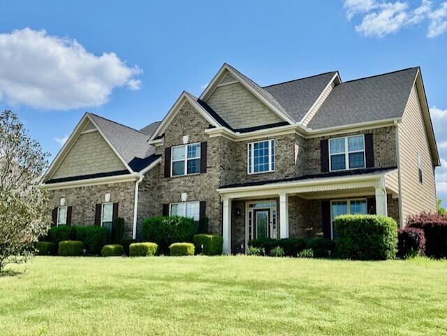 603 Yonto Dr, Grovetown, GA 30813 - craftsman house with a front yard and stone siding