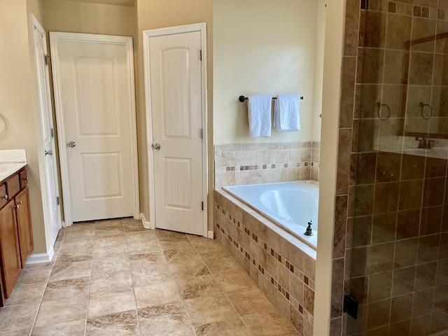 603 Yonto Dr, Grovetown, GA 30813 - full bathroom with a garden tub, a shower stall, and vanity