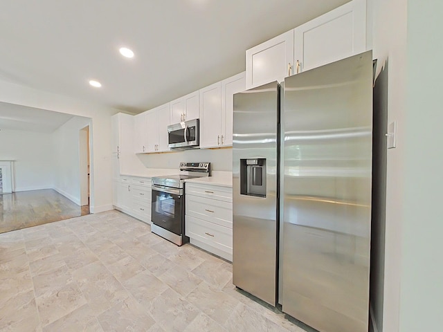 1904 Robin Rd, North Augusta, SC 29841 - kitchen featuring stainless steel appliances, white cabinetry, light countertops, and recessed lighting