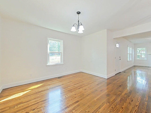 1904 Robin Rd, North Augusta, SC 29841 - spare room with a chandelier and wood finished floors