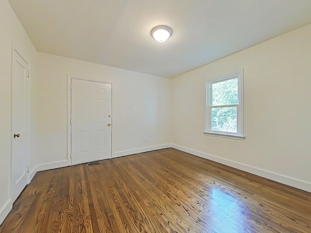 1904 Robin Rd, North Augusta, SC 29841 - empty room with dark wood-type flooring and baseboards