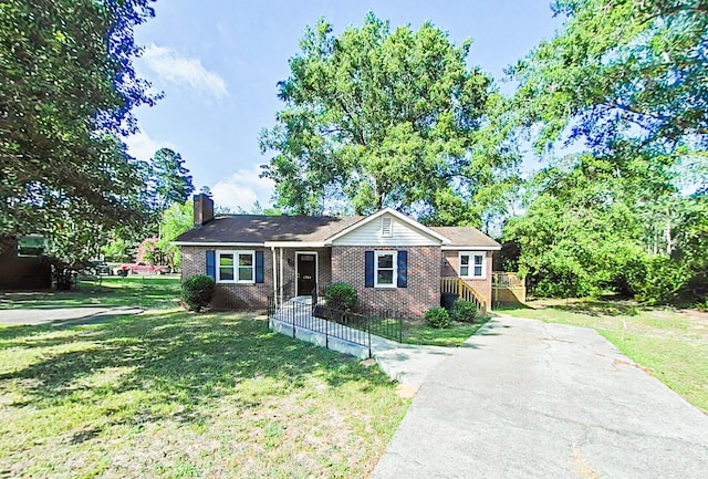 1904 Robin Rd, North Augusta, SC 29841 - single story home with brick siding, a chimney, and concrete driveway