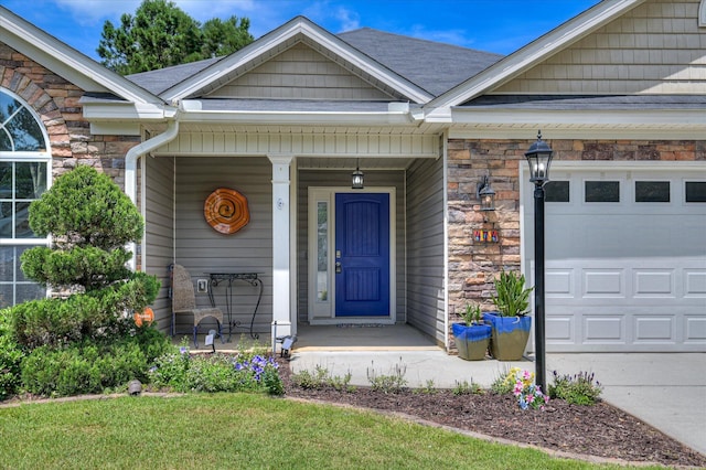 474 Sebastian Dr, Grovetown, GA 30813 - property entrance with stone siding, a porch, and an attached garage