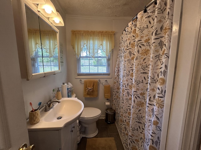 full bathroom with a shower with curtain, toilet, a textured ceiling, and vanity