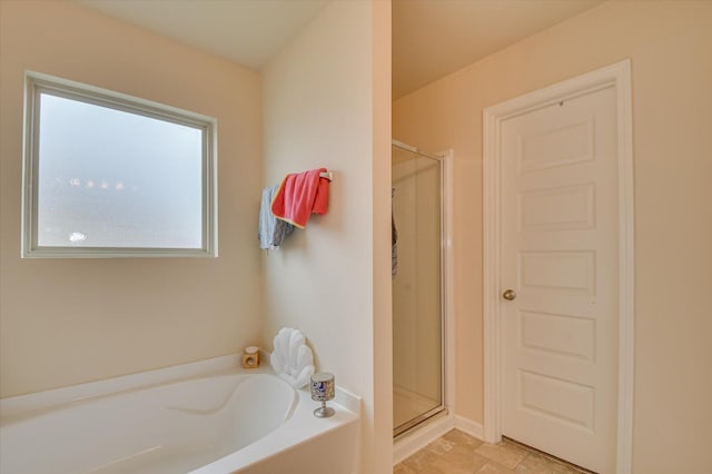 bathroom with independent shower and bath