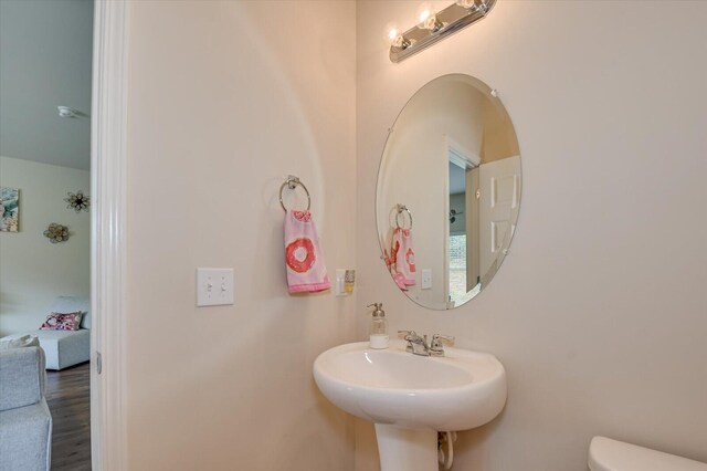 bathroom with toilet and sink