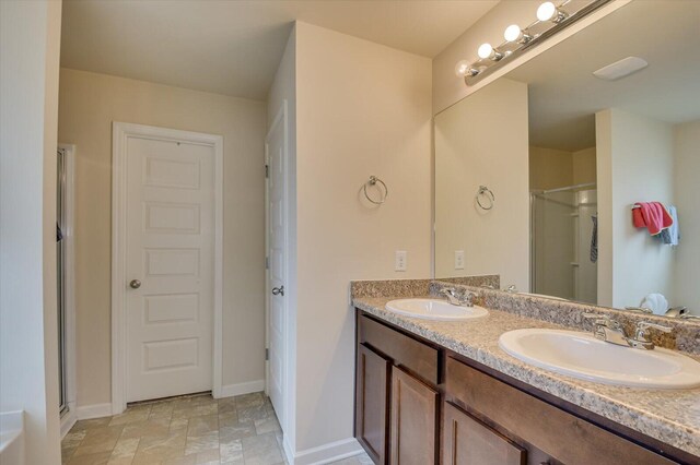 bathroom featuring vanity and walk in shower