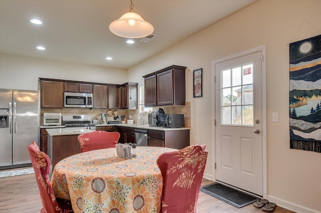 dining area featuring light hardwood / wood-style flooring