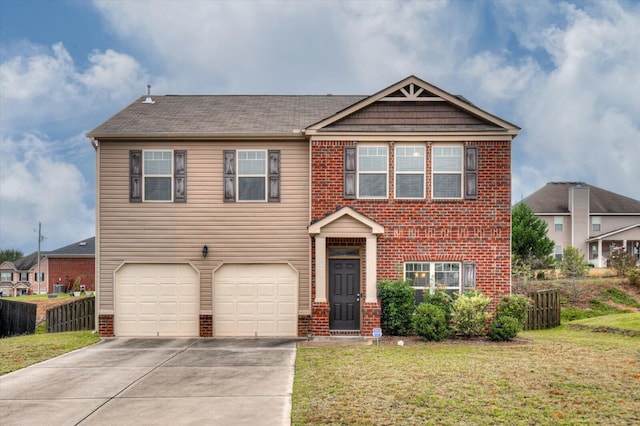 view of front of home with a garage and a front lawn