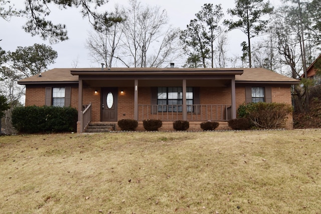 view of front of home featuring a front lawn and a porch