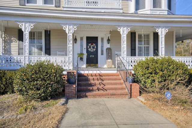 entrance to property with covered porch