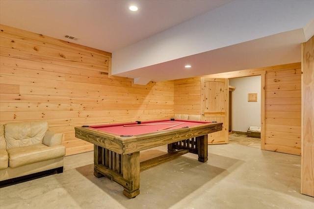 recreation room featuring wood walls, billiards, and concrete floors