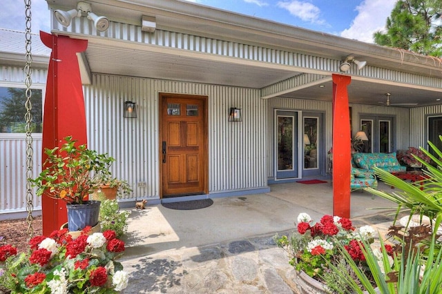 property entrance featuring covered porch