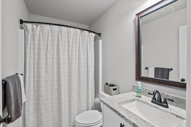 full bathroom with vanity and toilet