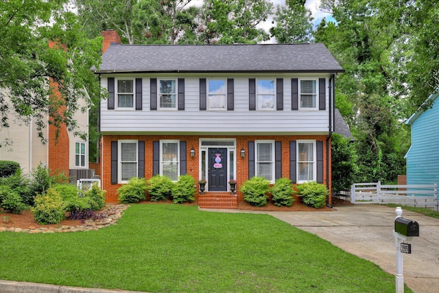 3555 Watervale Way, Martinez, GA 30907 - colonial-style house featuring a chimney, brick siding, and roof with shingles